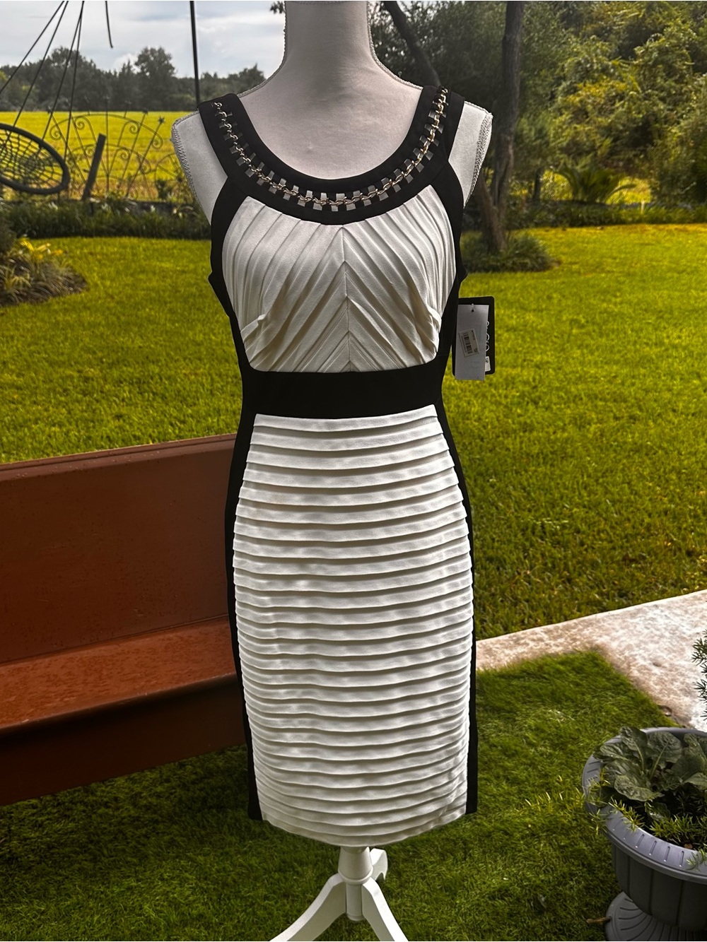 Jax Black and White Pleated Sheath Dress with Chain-Accent Neckline